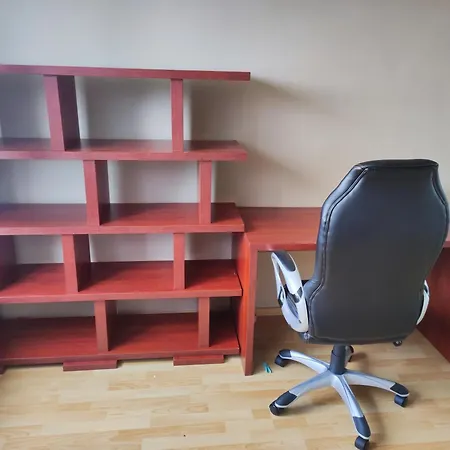 Komuni Apartmán *